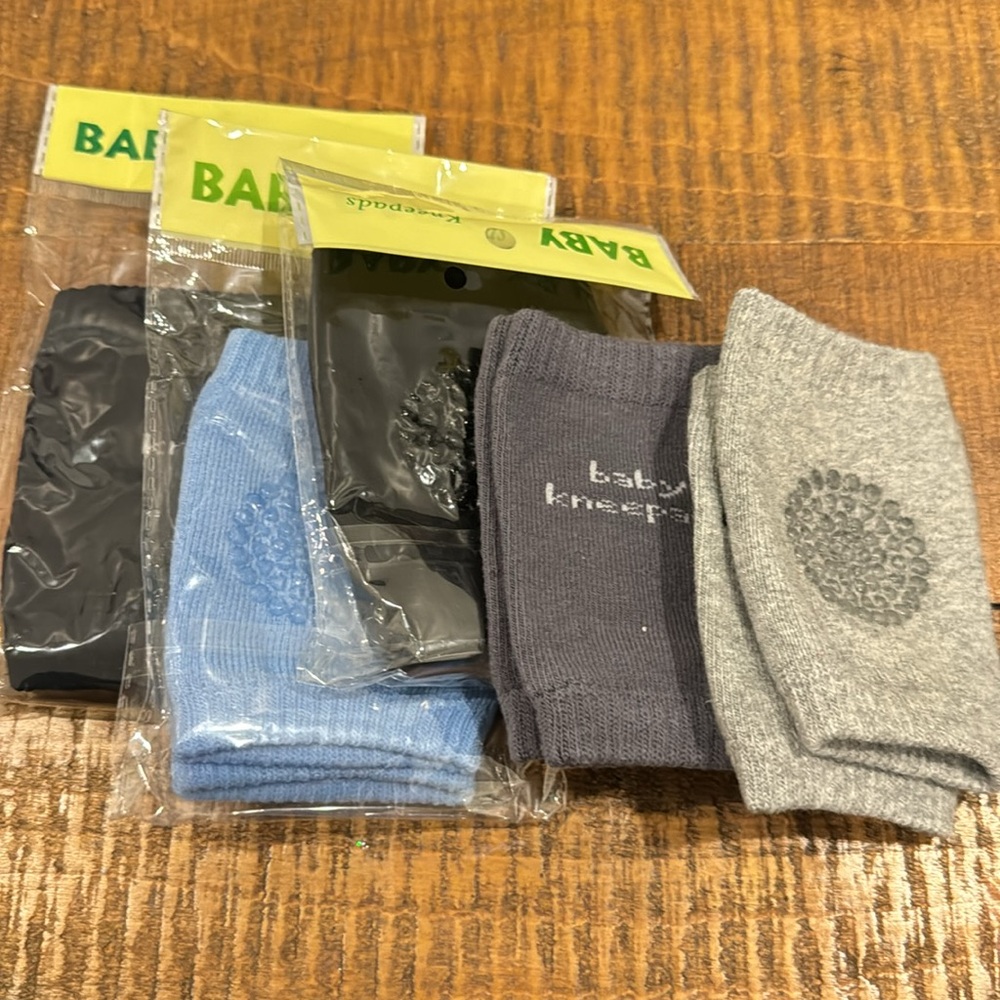 Baby knee pads, mostly brand new in package